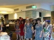 8 - Lynda R & Reg M in far left hat parade